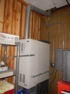 Dangerous furnace installation in garage