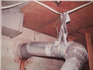 Hanging vent pipe from electrical wire